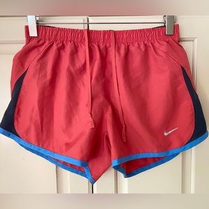 Nike Athletic Running Melon red Shorts wz gray under shorts.Women'S